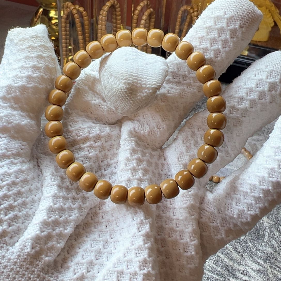 橄榄核手串高*学7.1mm清水极限弧