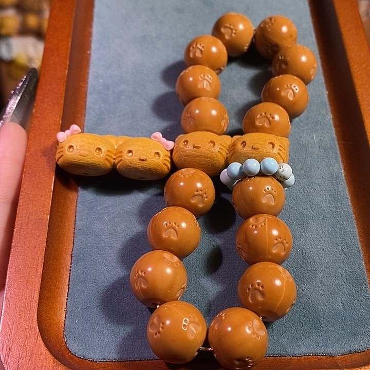 猴头核桃手串猫爪手持蝴蝶结