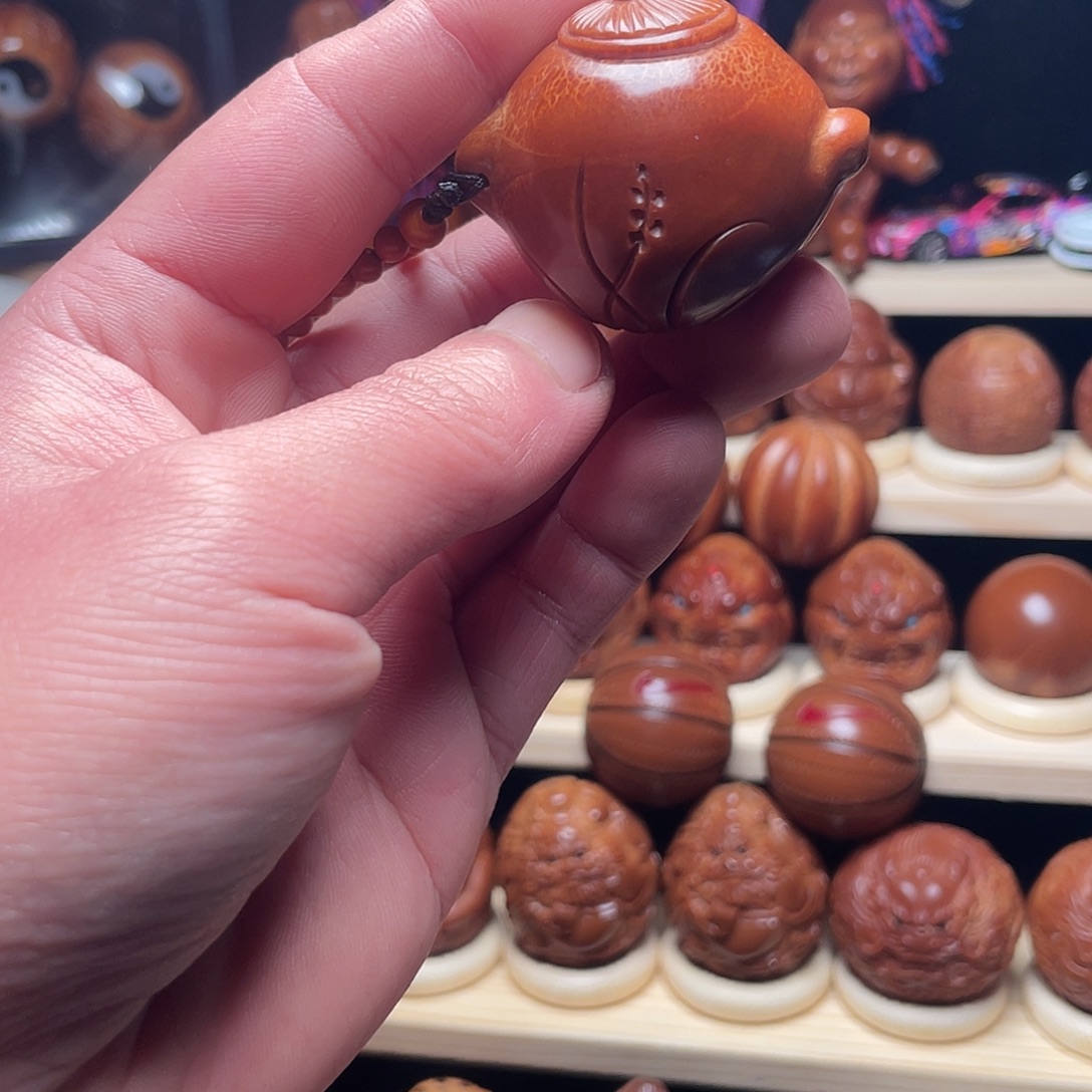 一***秦橄榄核吊坠兄弟福利把把壶手把件