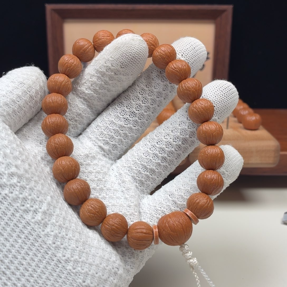 @***顺吊坠猴头核桃凤羽