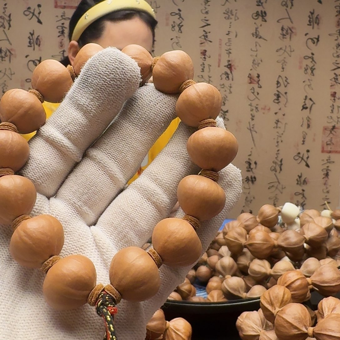 韩***猪手串橄榄核铁核南瓜籽