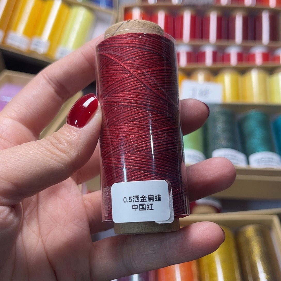 0.5洒金扁蜡中国红20克