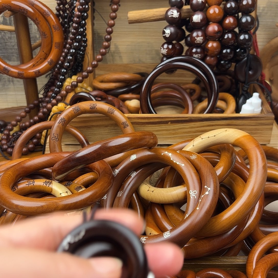 知***平2.5内径枣木玉化镶银乾坤圈