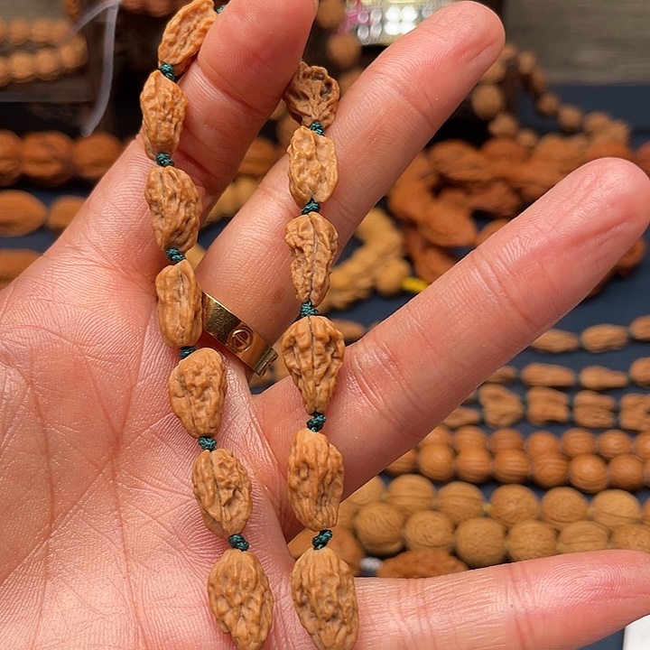 奔***跑文玩核桃吊坠文玩核桃