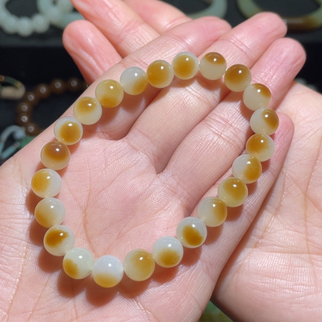 和田玉新疆且末金山一口糖手串未镶嵌