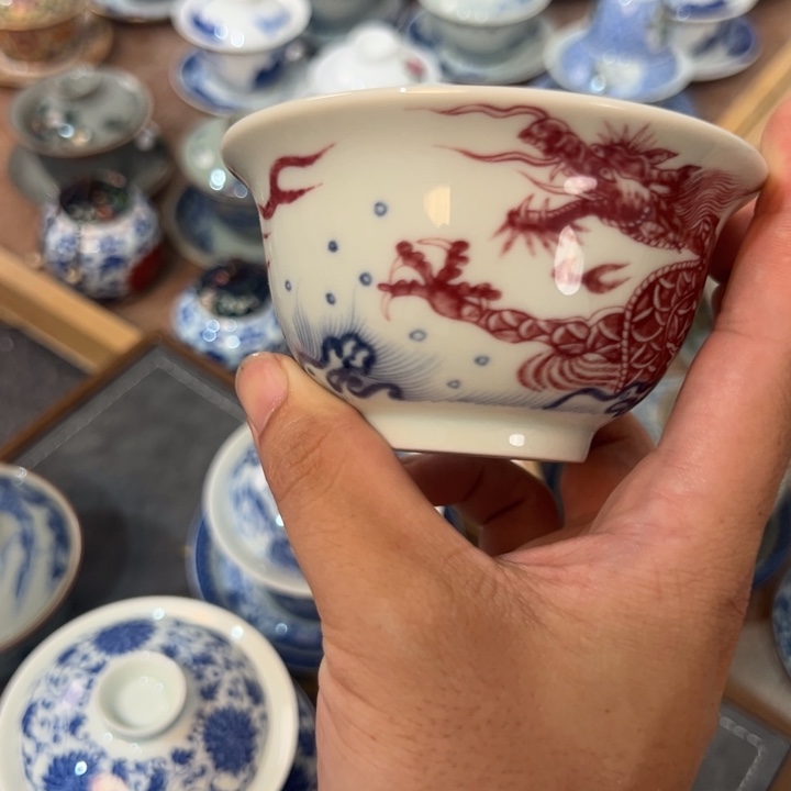 白青花釉里红鱼化龙压手杯带线