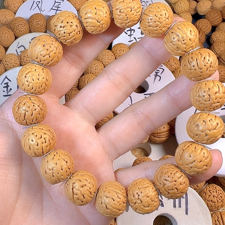 桃核吊坠17金丹桃核手串