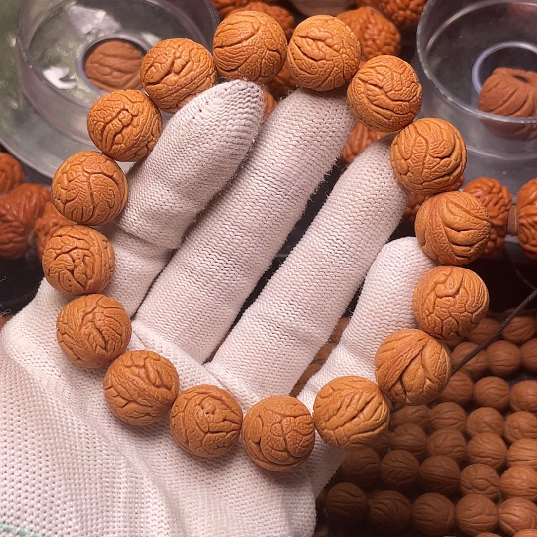 手串桃核金丝龙珠手串