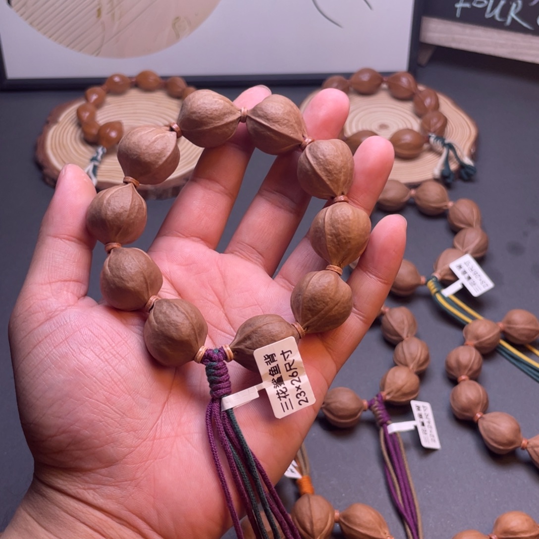 楊***東橄榄核手串梅林铁核三花鲨鱼背原皮素串23×26尺寸