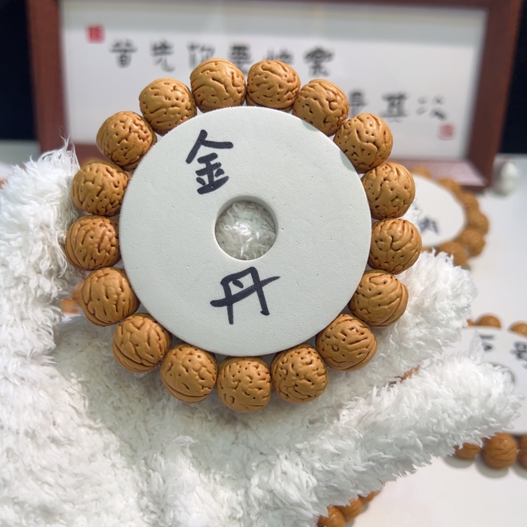 桃核手串老树金丹