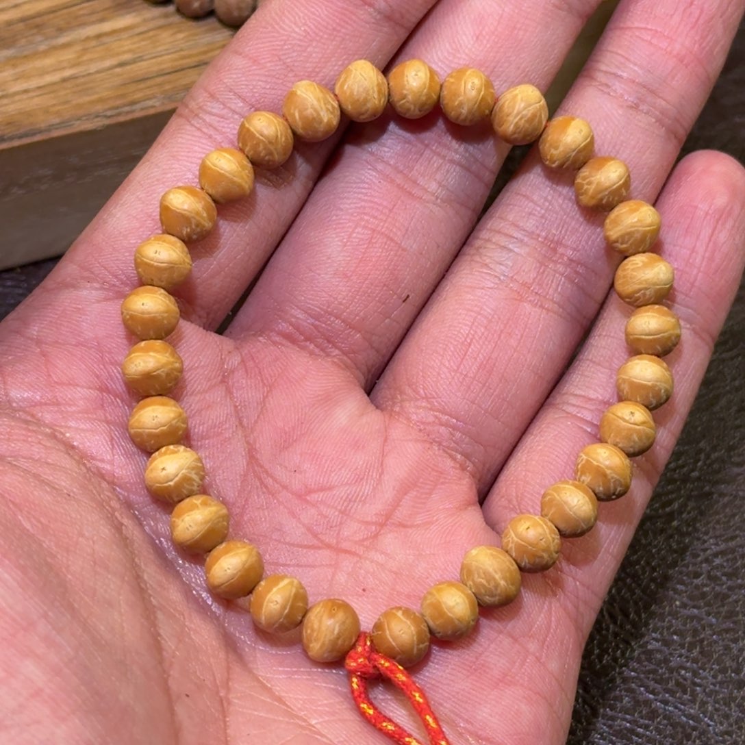 穆***白橄榄核手串/手链国目凤眼酸枣核手持福利