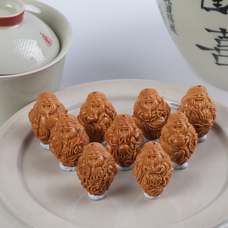 九龙财神-橄榄核雕刻