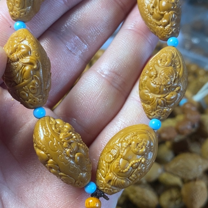 橄榄核手串18哈哈斤斤计较