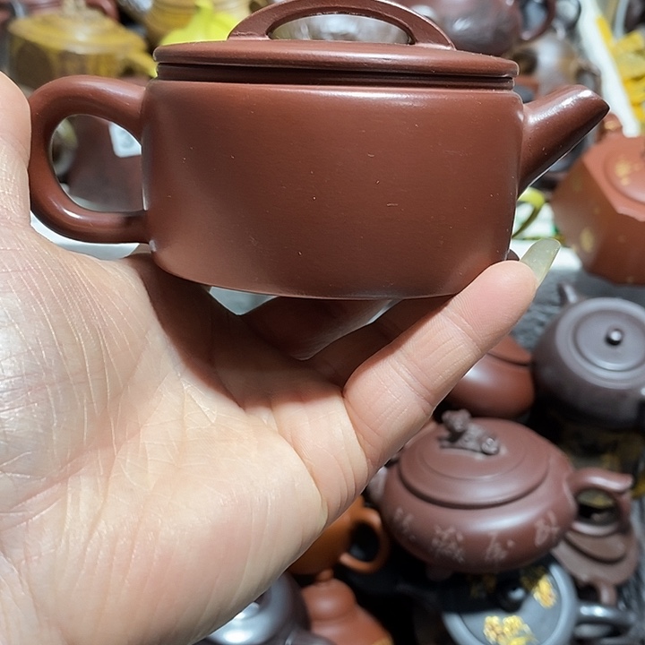 紫砂茶壶划痕微笑