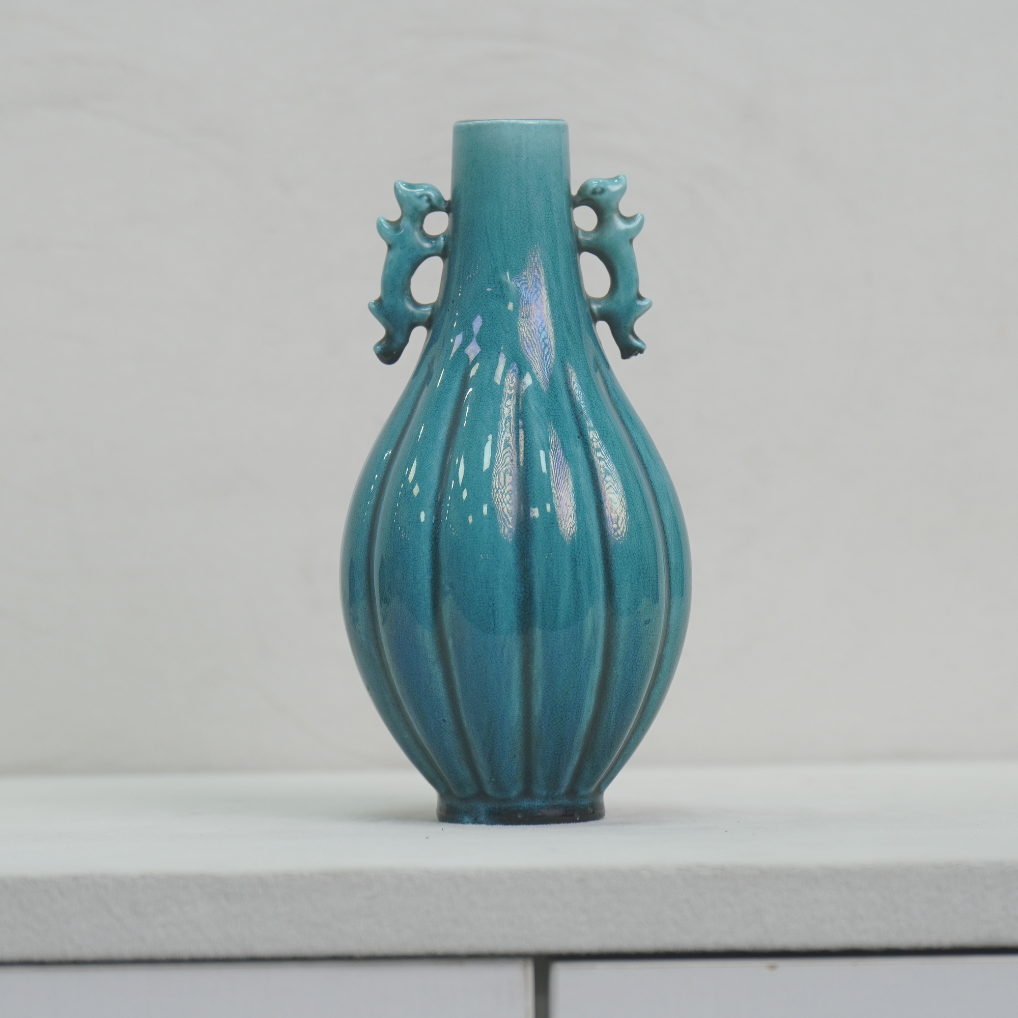 孔雀蓝釉瓜棱双凤耳橄榄瓶