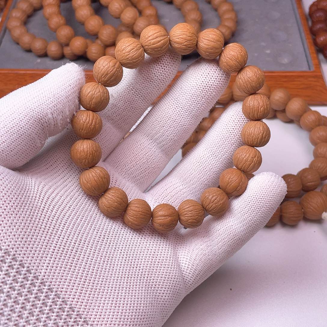 猴头核桃手串依**洒凤羽