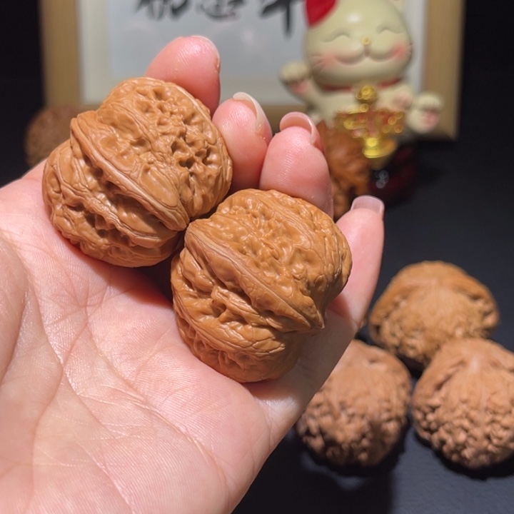 偶***尔文玩核桃把件36元宝