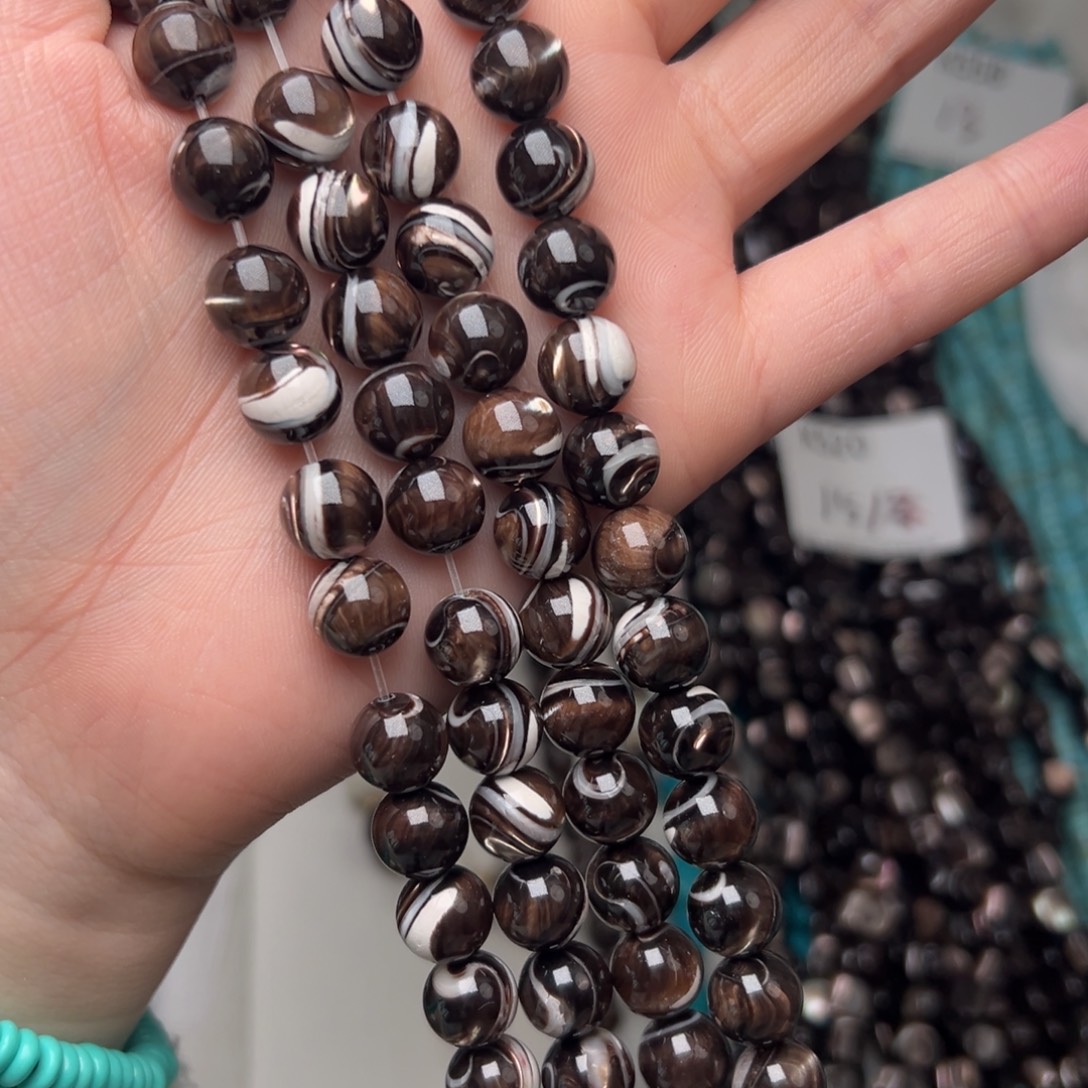 玛瑙/玉髓合金珠宝半成品K525。10mm天然黑金贝圆珠一条