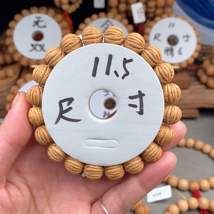 桃核手串拂***秘龙心11.5尺寸误差0.5之间