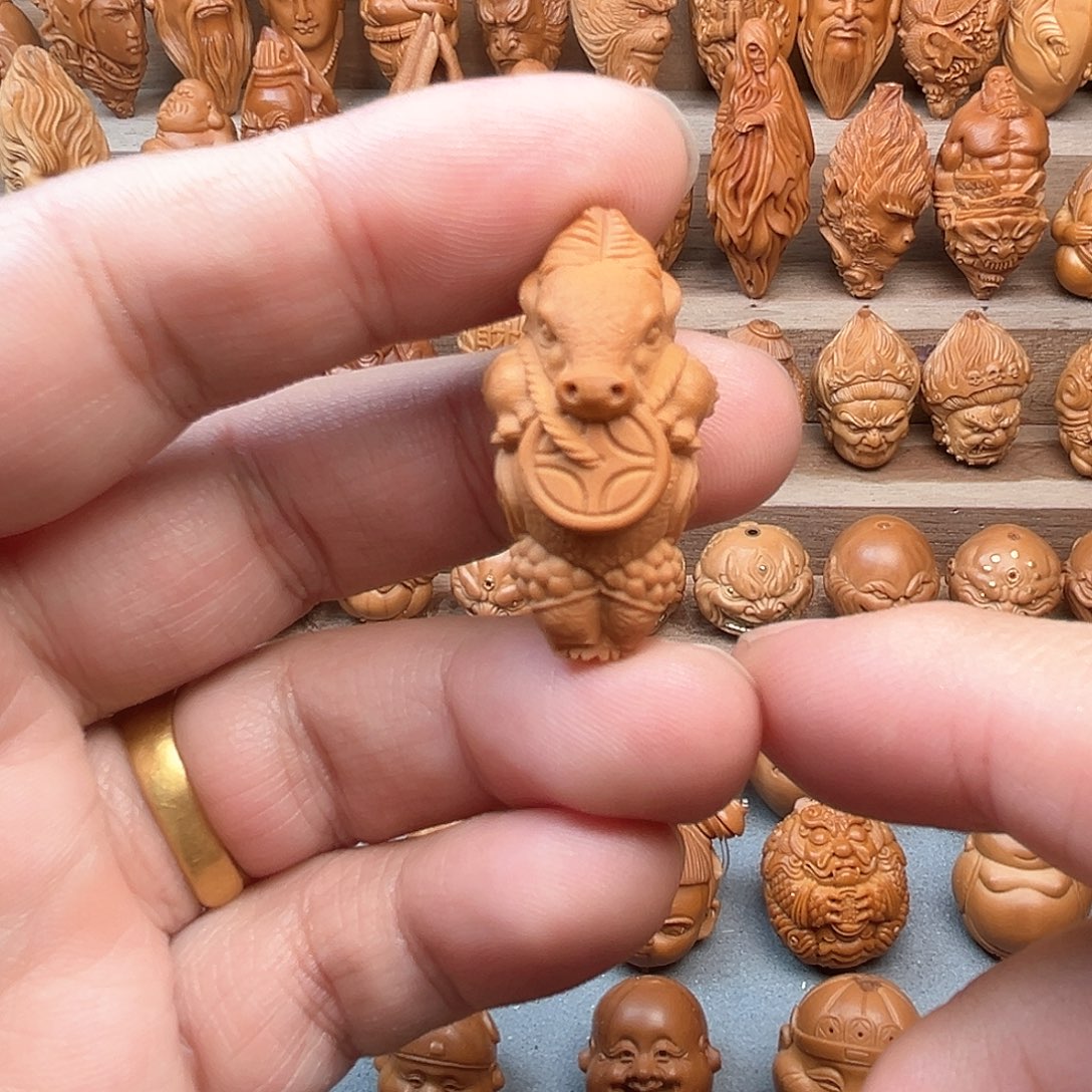 橄榄核吊坠18牛气冲天