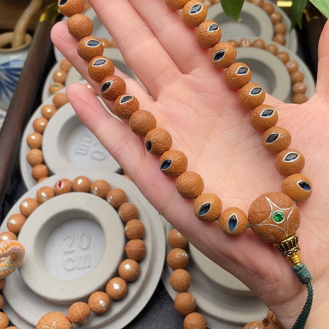 凤眼菩提吊坠紫金