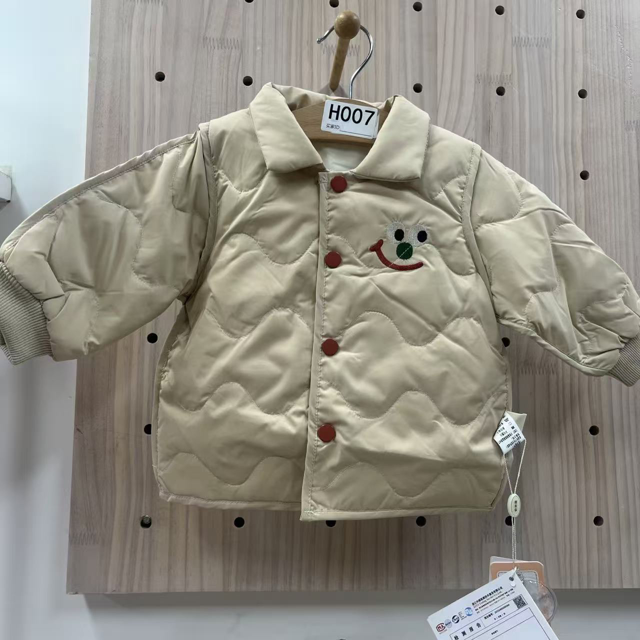24533-谷米熊刺绣笑脸羽绒外套