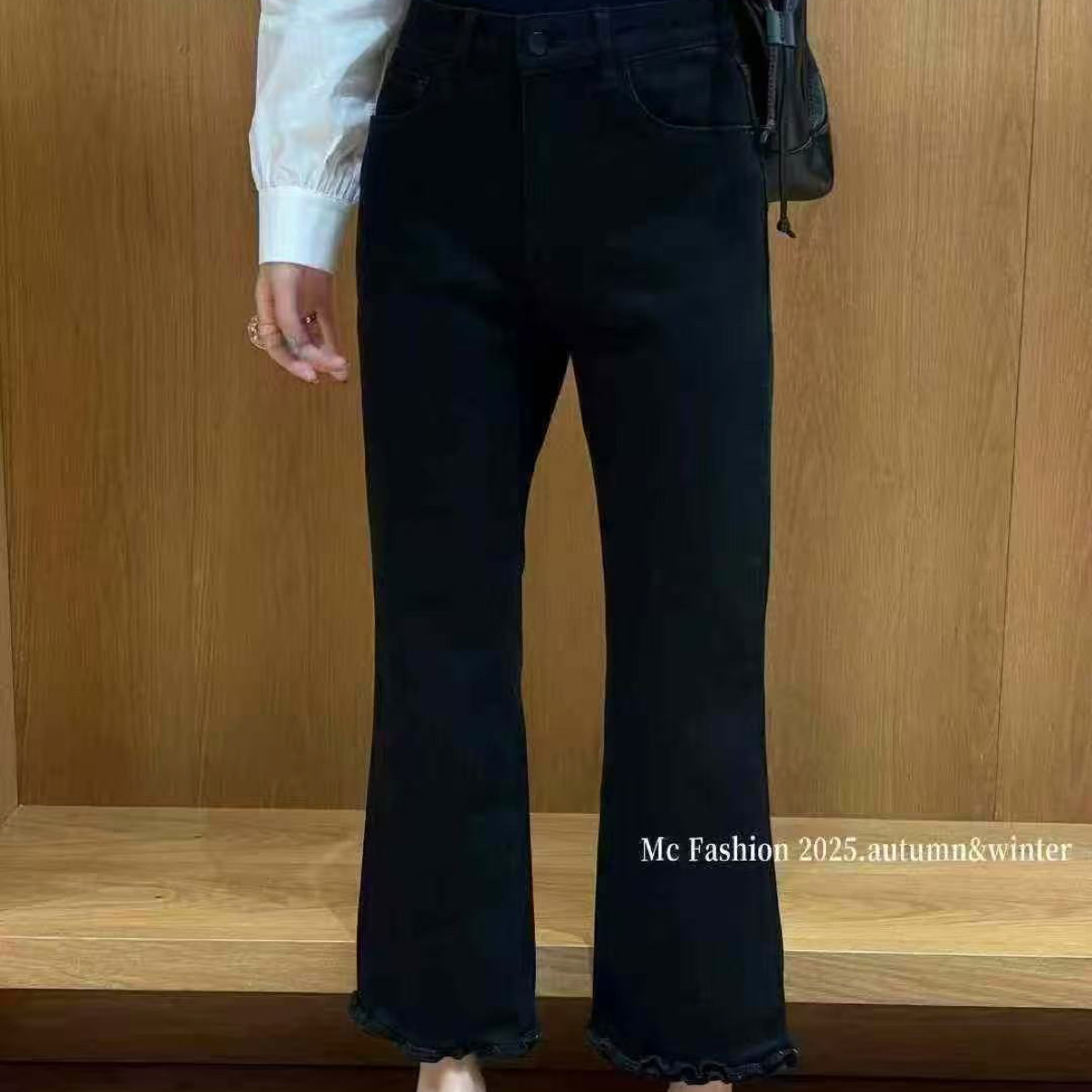 女士黑色高腰毛边九分微喇牛仔裤显瘦设计感十足