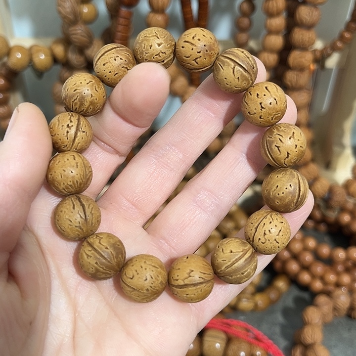 核桃把件野生桃桃枭光珠手串