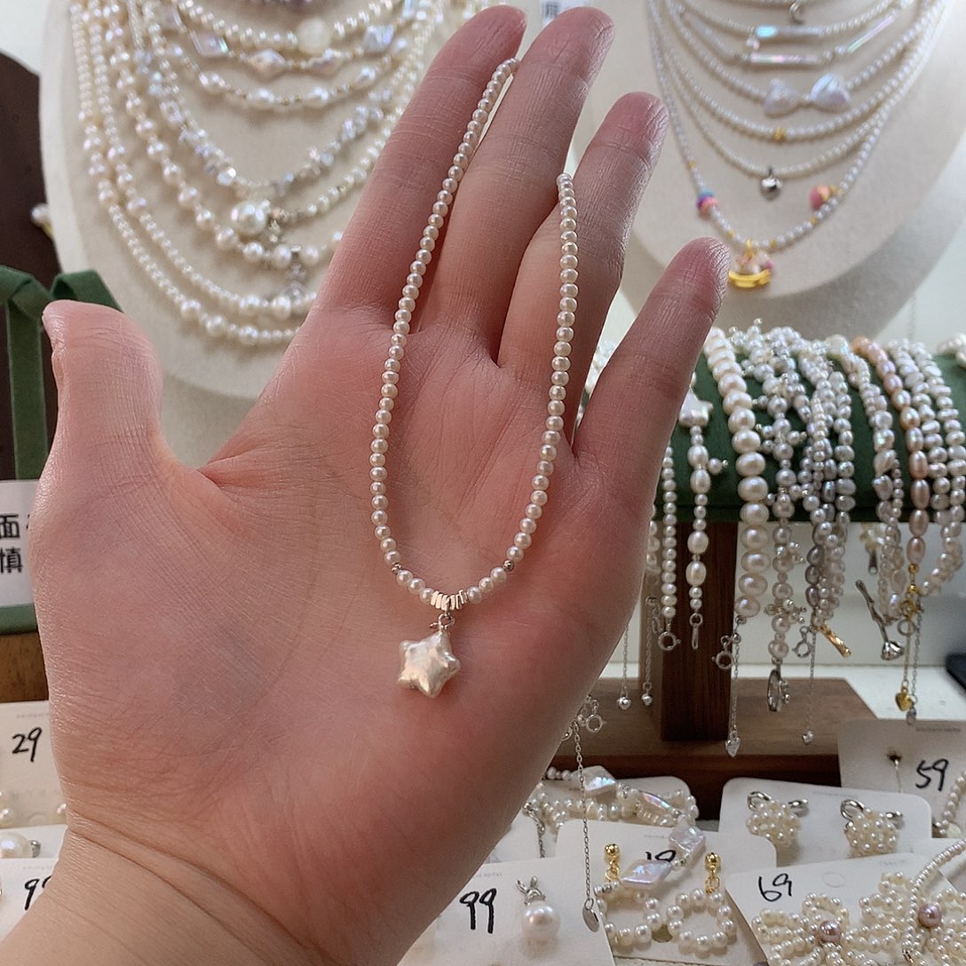 我***哒颈饰淡水珍珠银S925镶嵌星星