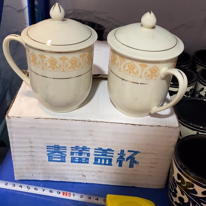 瓷片戳爷累象牙瓷盖杯一对