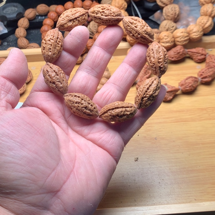 阿***颂文玩核桃吊坠野生精品小核桃散籽