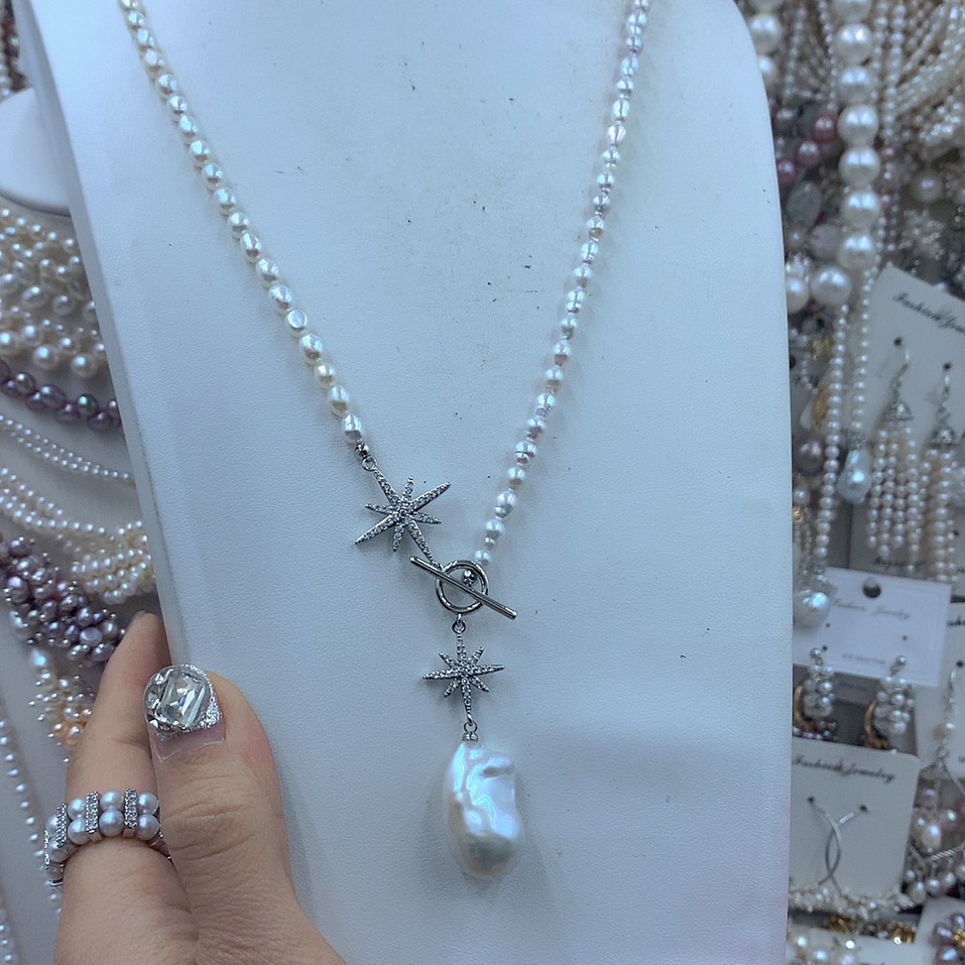 淡水珍珠银S925镶嵌耳饰