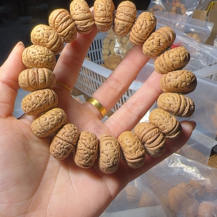 快***条桃核吊坠盘锦夹板