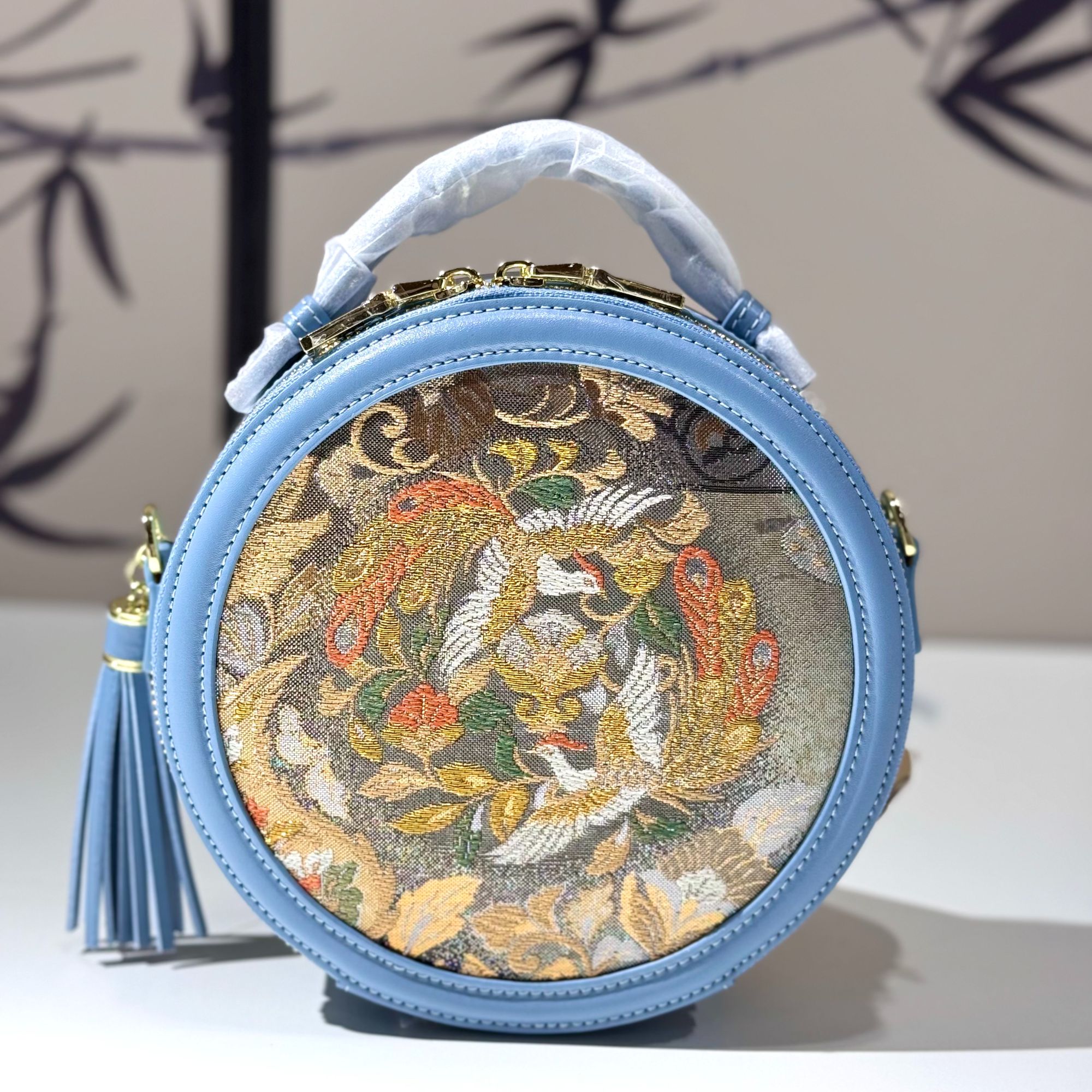 【新品】非遗手工织锦宝相花 蓝色流苏大圆饼包 手拎斜跨包