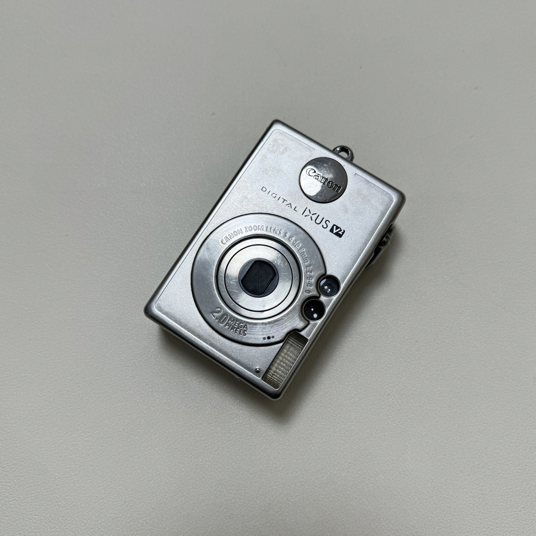 9新 Canon/佳能 佳能ixusv2 200像素 2倍光学 卡槽需要用贴纸贴