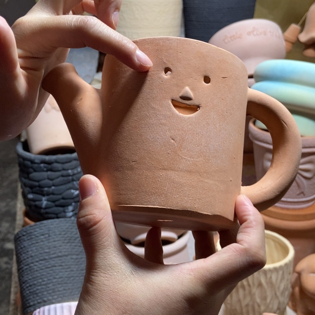 17×10手工笑脸水壶花盆 粗陶1个