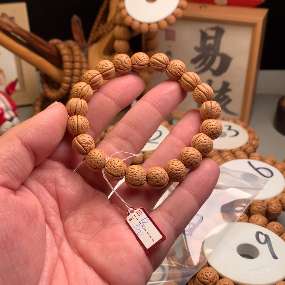 刘***Y桃核手串1.2黄胖桃核手串