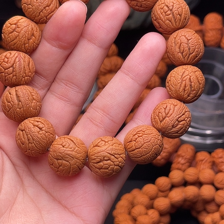 手串桃核金丝龙珠1.6