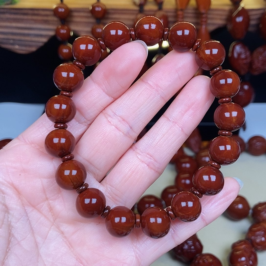 橄榄核吊坠.***己正圆光珠