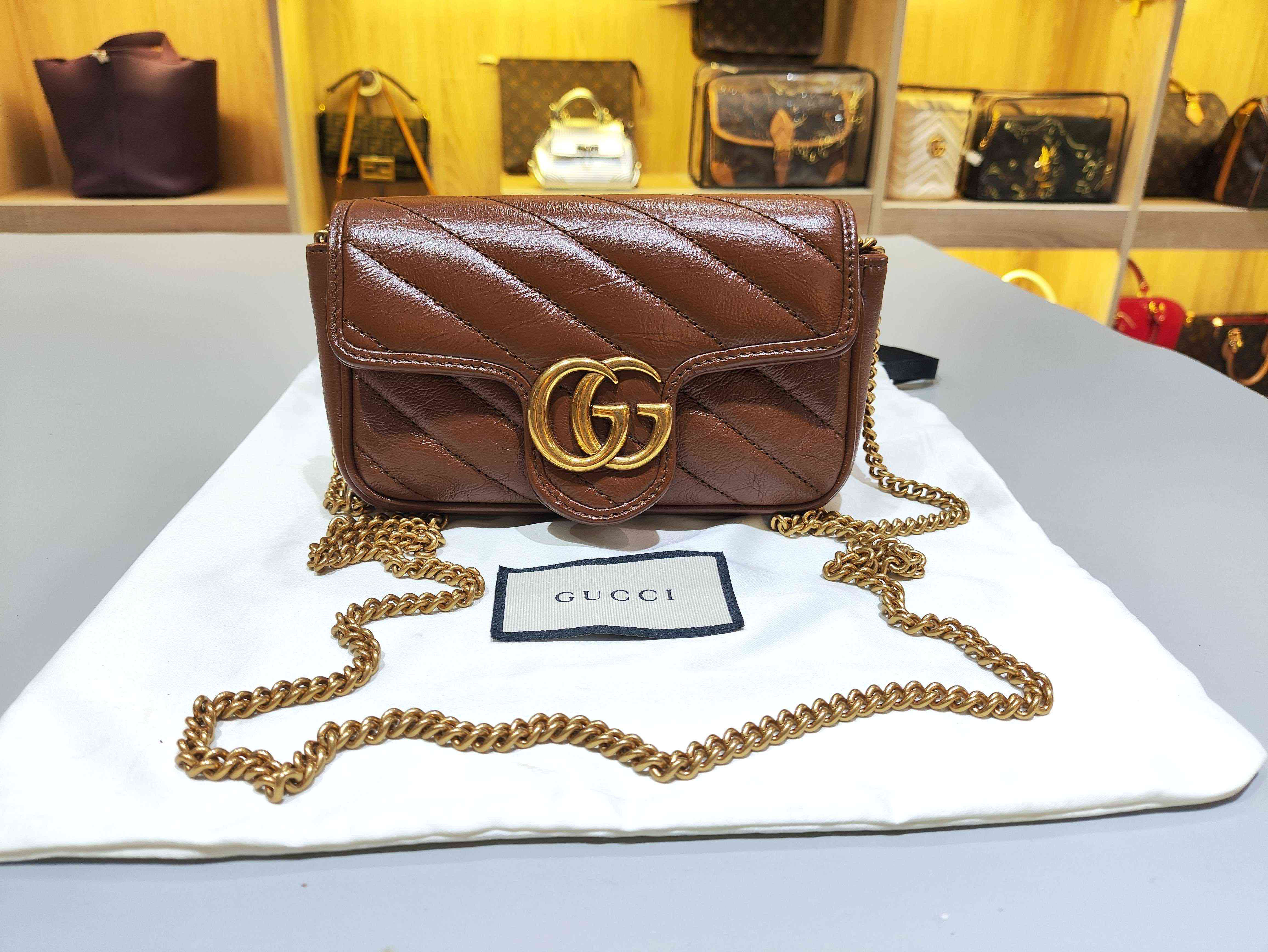 99新 GUCCI/古驰 未使用焦糖色斜挎超mini包