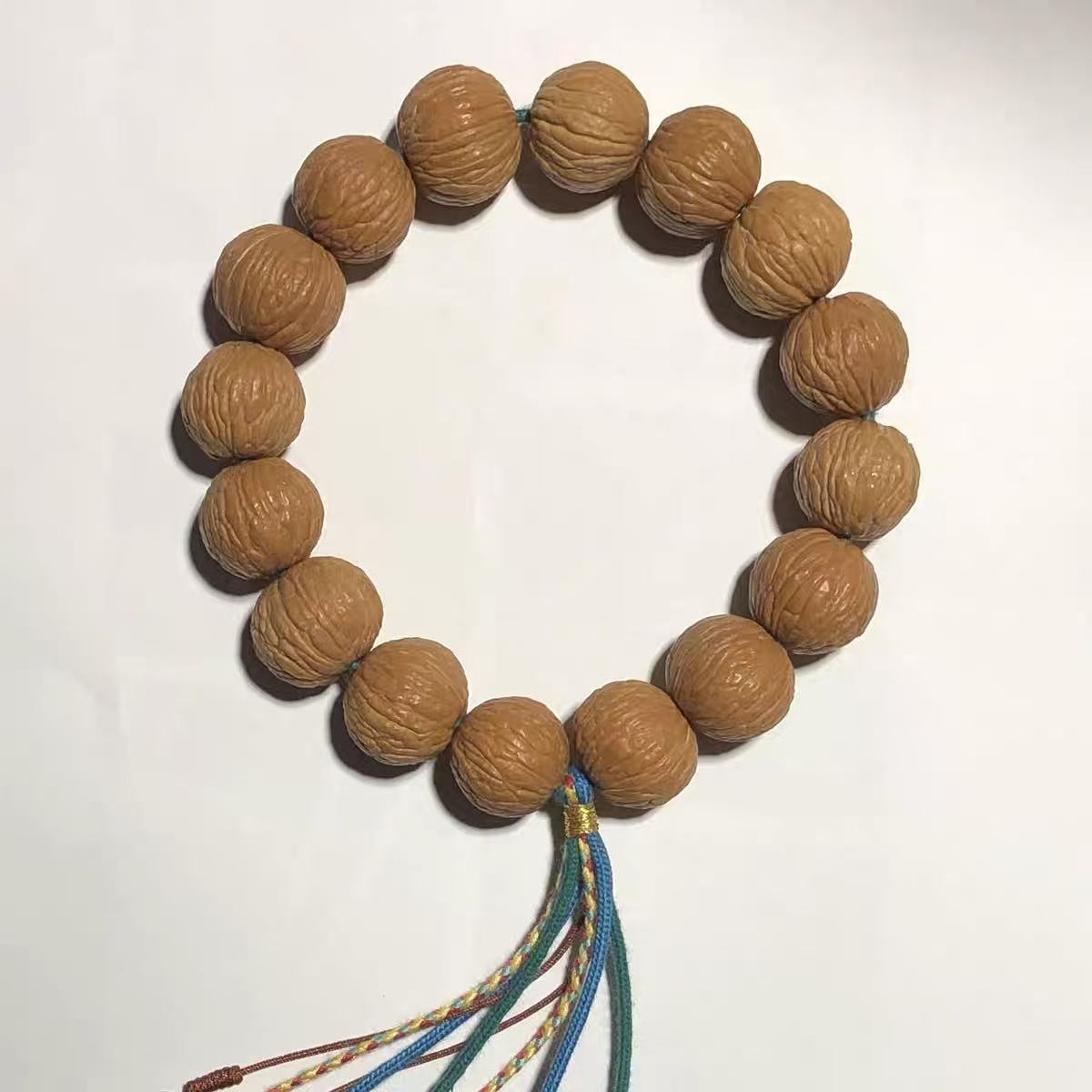  凤手羽手持猴头核桃原皮原色文玩手持手串