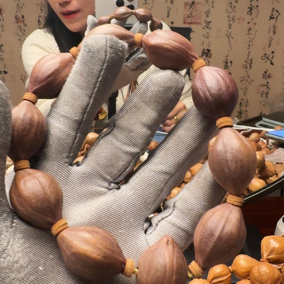橄榄核把件紫皮核