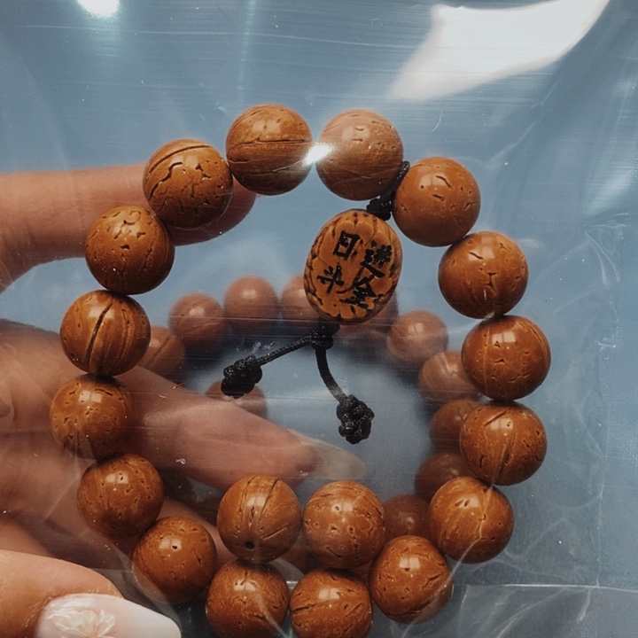 大****)桃核手串极限圆15全品15颗