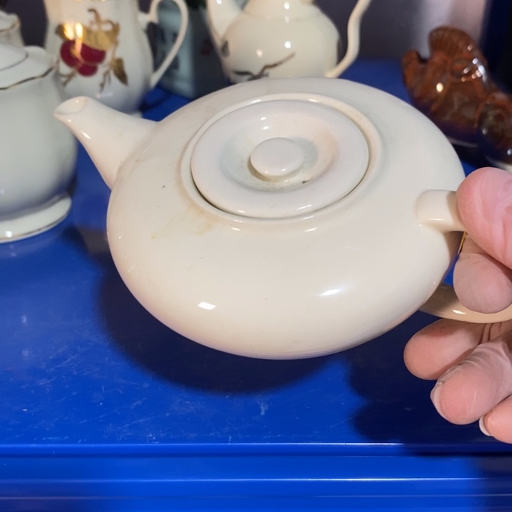 瓷片象牙瓷手把壶