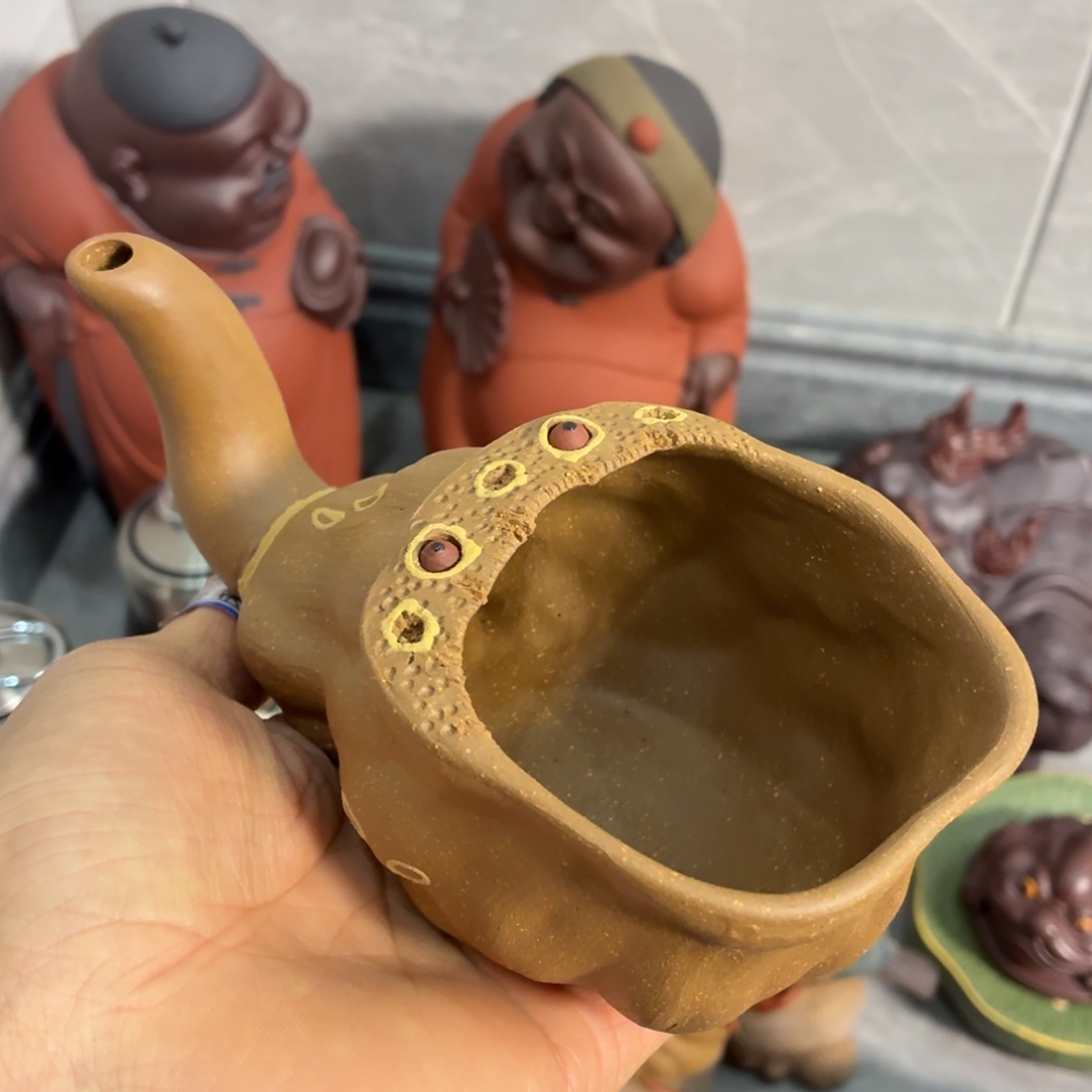 紫砂茶杯放漏放漏放大漏了