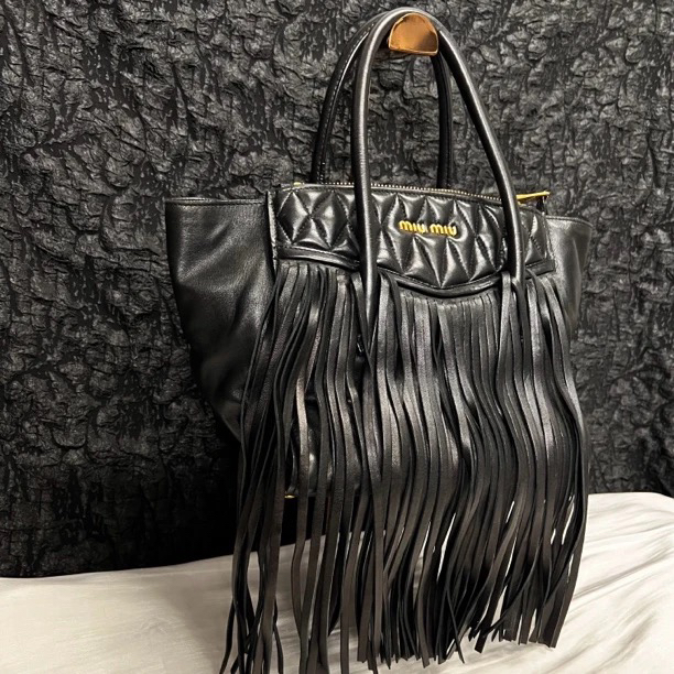 95新 MIU MIU/缪缪 缪缪黑金流苏手提包