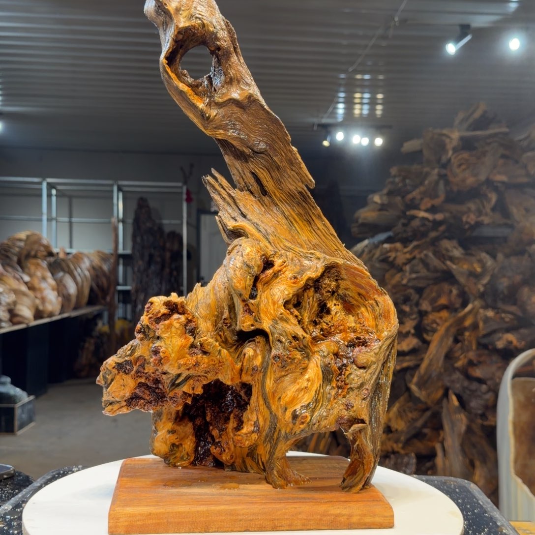 用***8木王一刀琥珀木摆件38