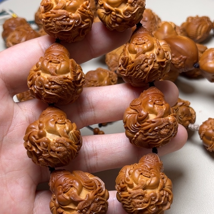 悠***得手串橄榄核御龙财神
