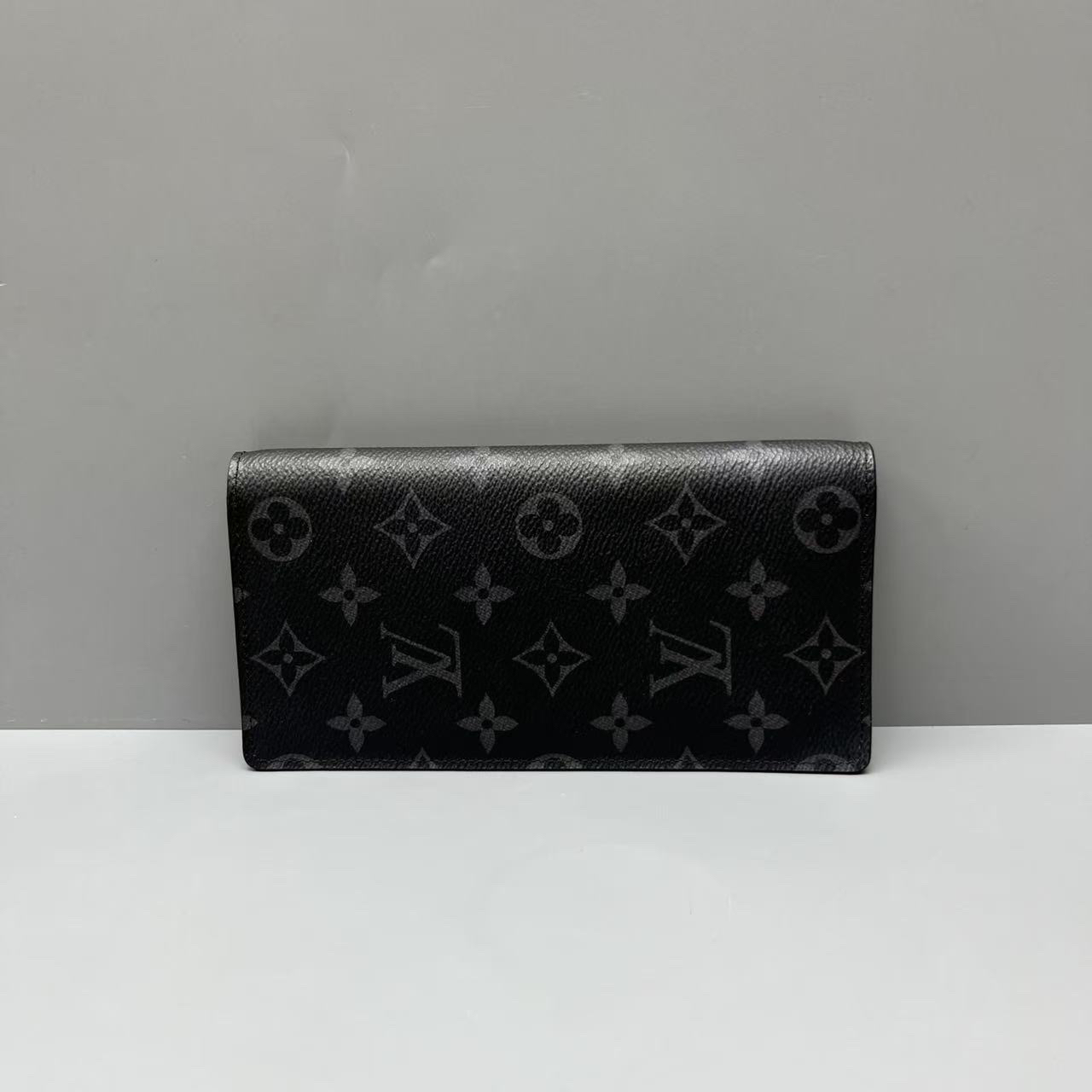 95新 LouisVuitton/路易威登 黑花长款对折钱包 尺寸19*10SV14633