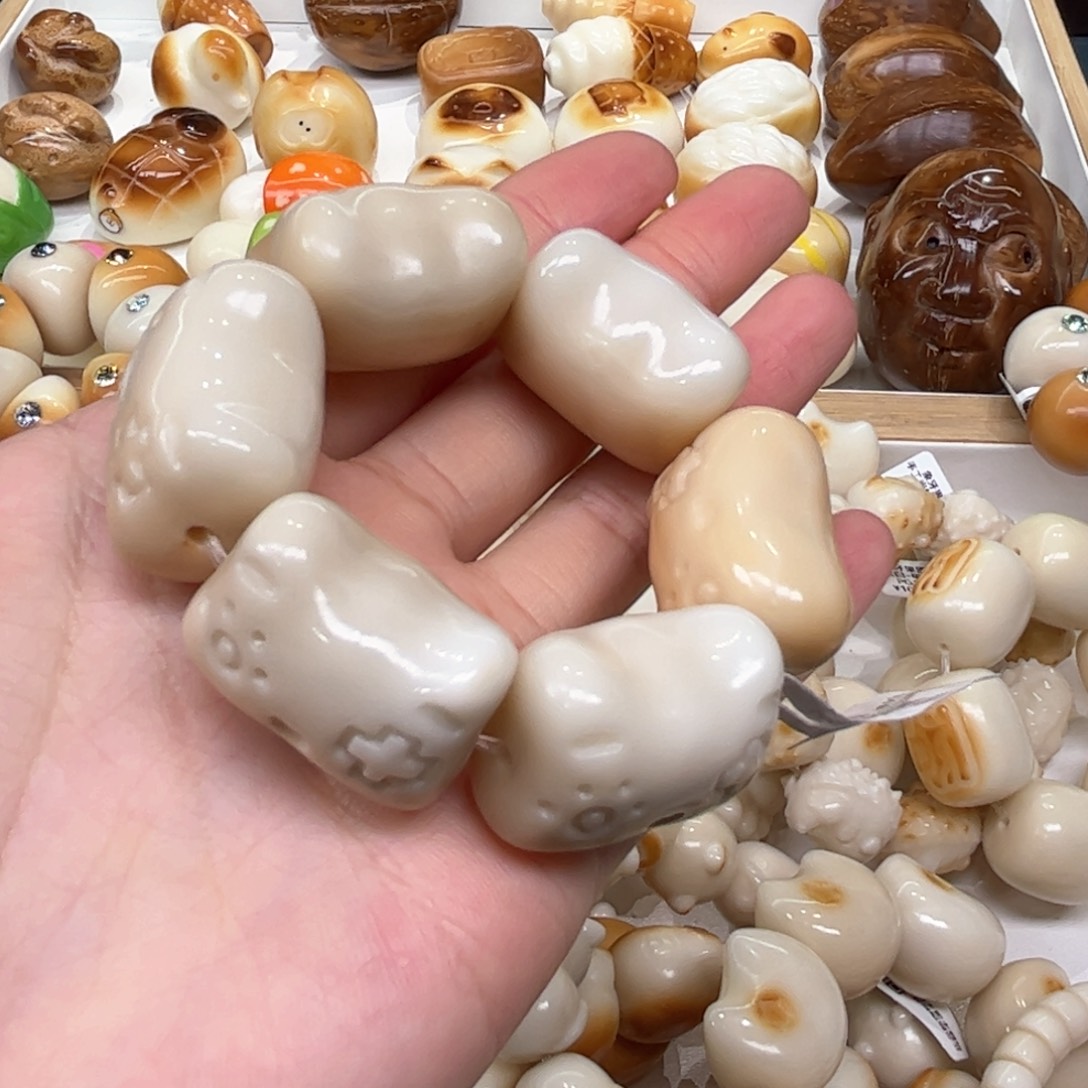 菩提根/象牙果手串8.6.25象牙果游戏机猫头瑕